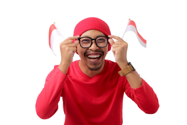 istock Indonesian Man Celebrating National Team Victory on Independence Day 2167728107