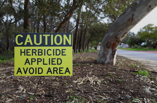 istock Warning, caution sign, indicating herbicide has been applied and asking people to avoid the area 2167729069
