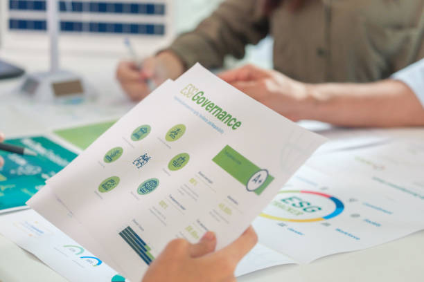 istock diversity team discussion about esg and eco friendly system planning in sustainable green office at night 2167730561