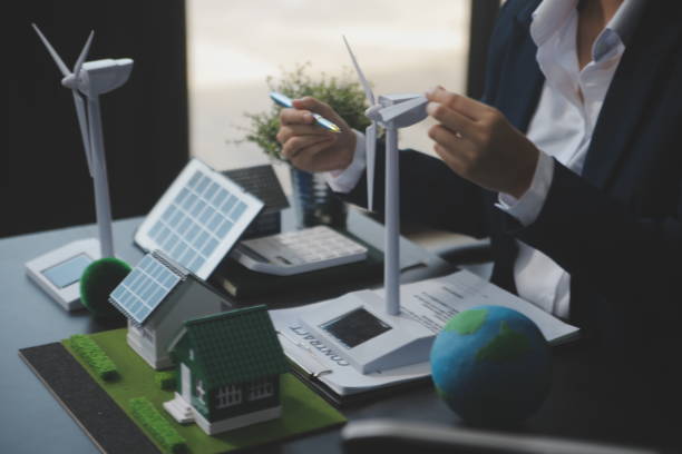 istock Carbon offset price report CO2 emission. Future growth Net zero waste in ESG ethical SME office protect climate change global warming social issues project. Group of asia people Eco friendly SDGs plan 2167732454