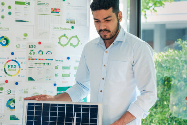 istock Diversity team presentation new design solar cell panel renewable energy innovation at office 2167732932