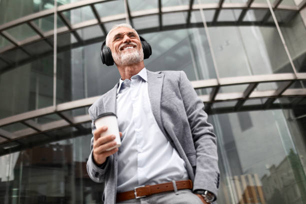 istock Businessman on Coffee Break with Headphones 2167735401
