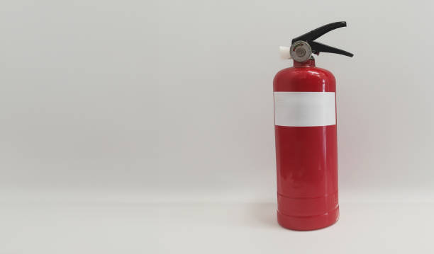 istock Red fire extinguisher isolated on white background, safety concept 2167743447