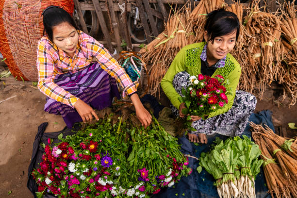 istock Burmese women selling flowers, Myanmar 2167748645