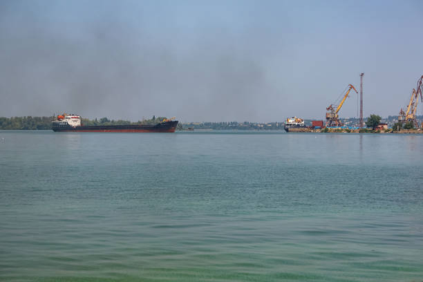 Cargo ship enters the river port. Dnipro