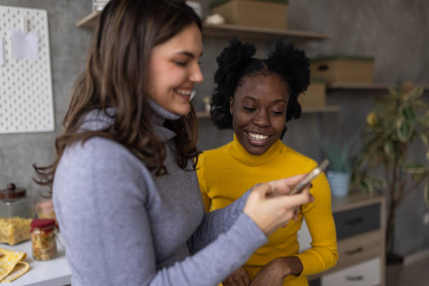istock Two excited women using a smartphone 2167753127