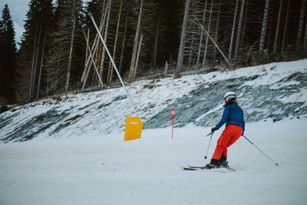 istock Skiing down by the forest in Alps 2167762063
