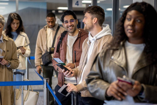 istock Travellers Wait Their Turn to Board 2167766104