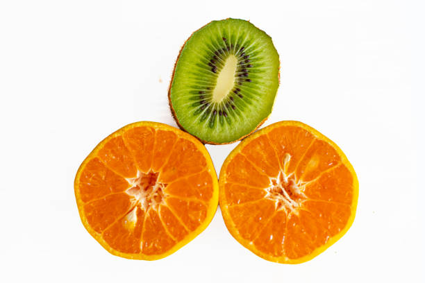 uncut orange on a wooden chopping board, cooking and desserts from ripe citrus orange
