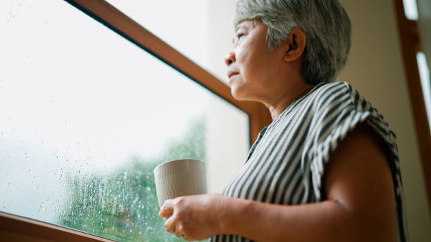 istock Retired Asian woman being alone at home and feeling abandoned. 2167775877