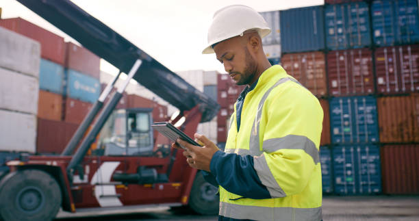 istock Cargo dock, tablet and man in logistic, quality control or stock management as foreman. Engineer, technology and inspection with freight, supply chain or industry for global shipping company 2167775886