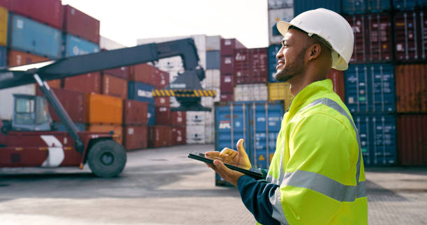 istock Logistics, man and container with tablet outdoor for cargo control, shipping inspection and management. Distribution, supervisor and digital tech for freight safety, import storage and supply chain 2167775972