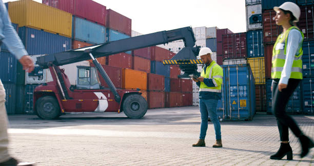 istock Logistics, man and busy in container yard with digital inventory, tablet and supply chain or freight. Supervisor, inspection and quality control in industry, shipping in trade for commercial export 2167776003