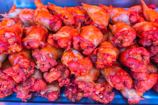 A large amount of fried chicken legs