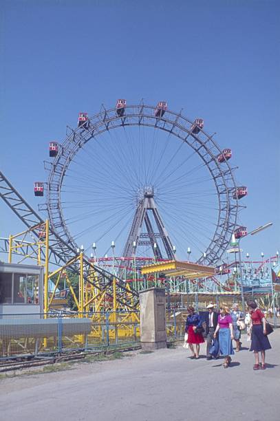 Vienna, Austria, 1975. The Vienna Prater with the famous Ferris wheel. Also: visitors.
