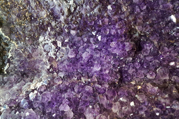 istock Purple amethyst, close-up. Backgrounds and textures. semiprecious stone. 2167777345