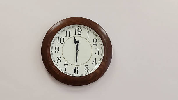 istock The wooden clock shows 11:30 a.m. 2167778288