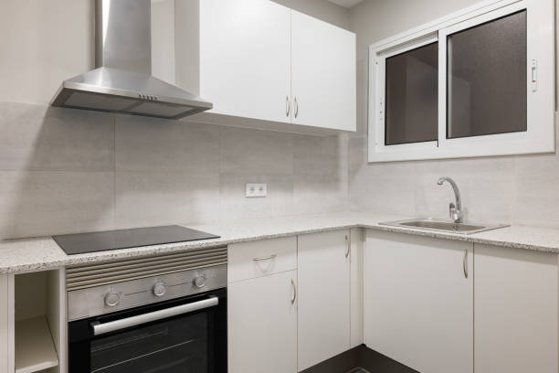 istock Modern kitchen interior with white cabinets and built-in appliances 2167779394