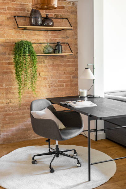 istock Design furniture bright work area at brick wall and pot-plant 2167784708