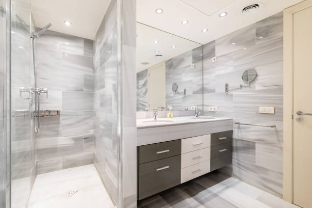 istock Bathroom with wall separating washbasin with vanity unit from shower 2167784885