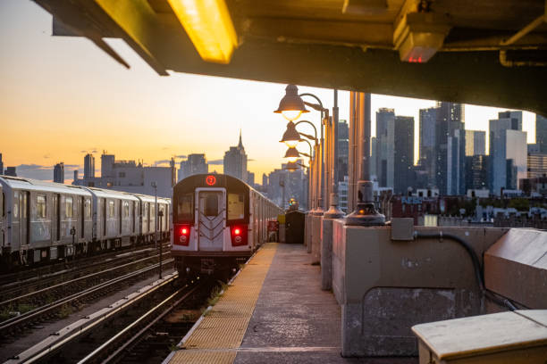 istock Subway Train on Elevated Tracks at Dusk in Queens NYC 2167790209