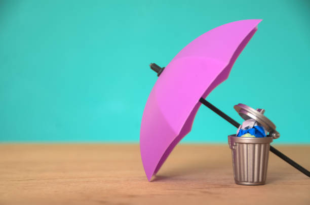 The image symbolizes the idea of protecting or safeguarding something seemingly insignificant or overlooked, like waste or discarded items.