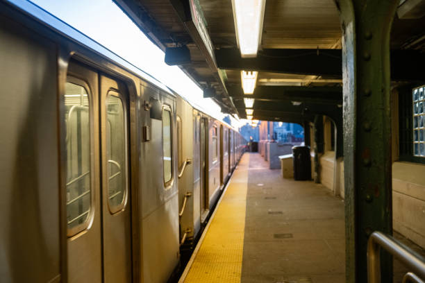 istock Train at Elevated Subway Station Platform in NYC 2167790286