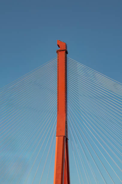 istock Close-up of a red modern cable-stayed bridge 2167792852