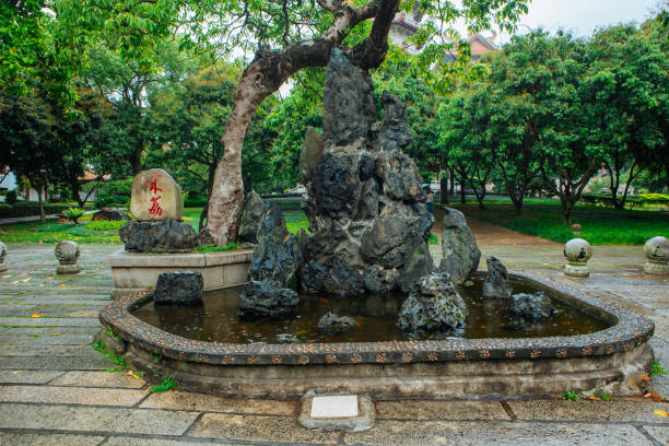 istock Chinese style garden landscape and ancient architecture on rainy days 2167794134