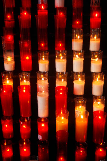 Close up of large group of red and white candles suitable for background purposes. Galicia, Spain.