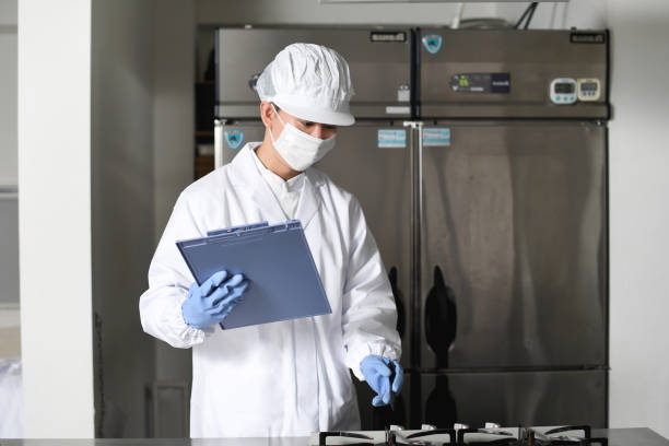 istock Asian man wearing sanitary clothes inspecting kitchen equipment 2167802195