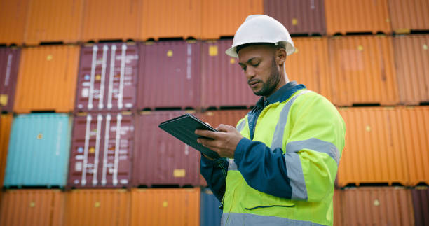 istock Checklist, container and tablet with man at dock or shipping yard for logistics and supply chain. Inspection, inventory and storage of cargo or freight for management of delivery, export and import 2167803096
