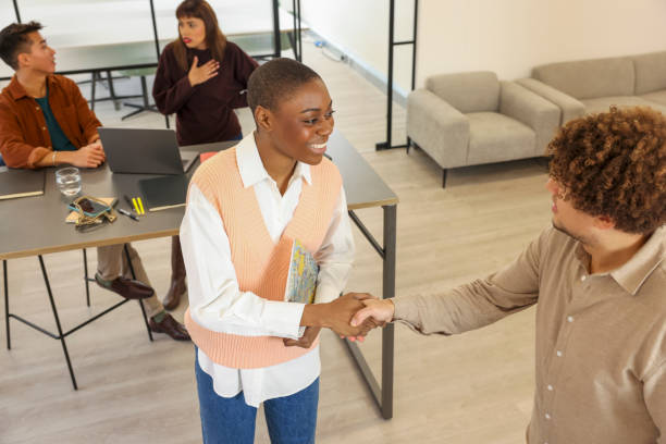 istock Business people shake hands in office 2167803260