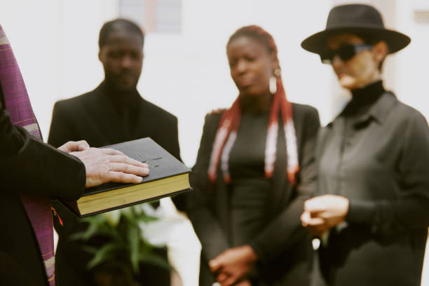 istock Pastor Holding Black Leather Bible 2167803393