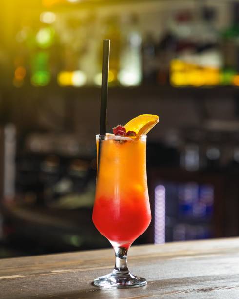 istock Alcoholic cocktail standing on bar counter with blurry background 2167806053