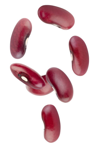 istock Red beans form an abstract figure in space. Isolated on white 2167806561