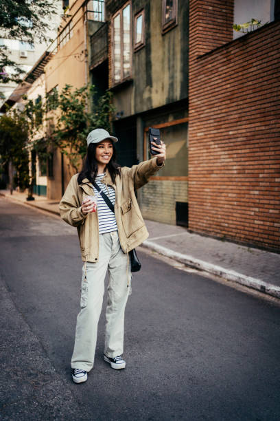 istock Young Japanese woman taking selfie 2167812864