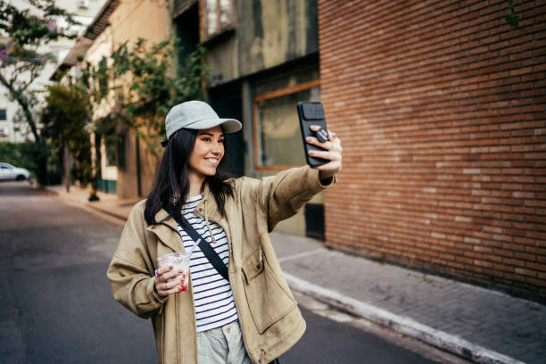 istock Young Japanese woman taking selfie 2167812868