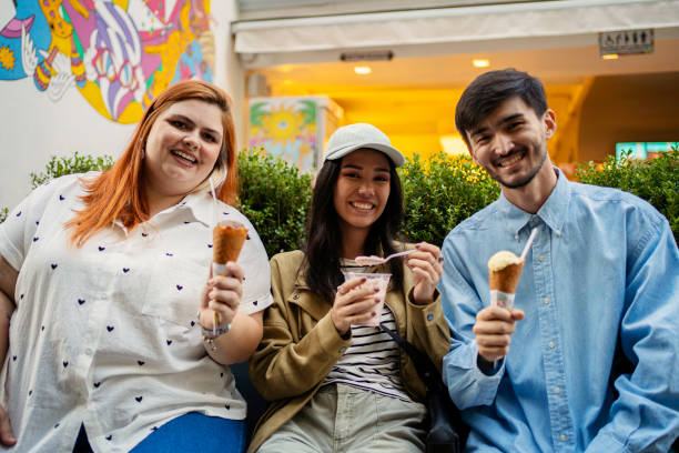 istock Young friends eating ice cream 2167812900
