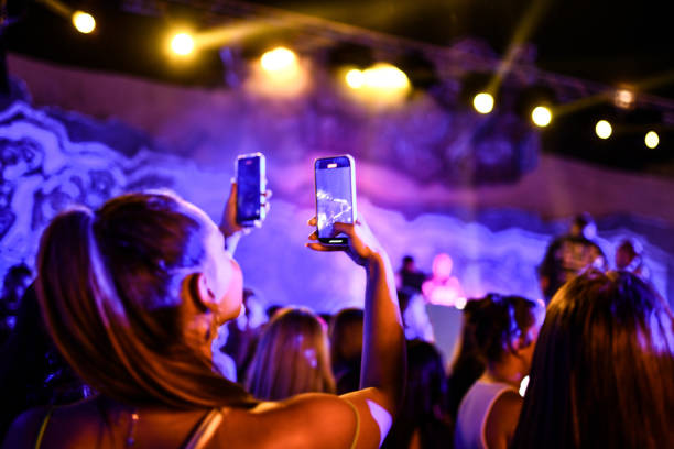 istock People Recording DJ Live During Party 2167812909