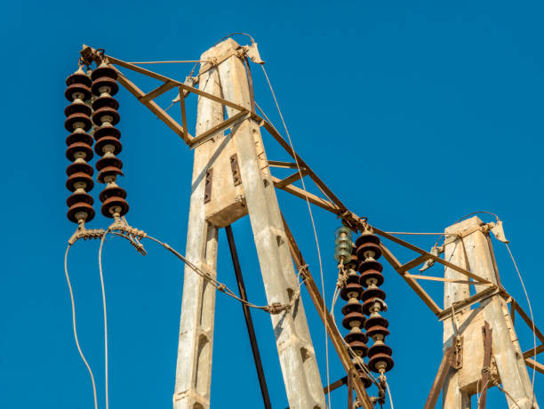 istock Old electric tower and a blue sky. 2167813768