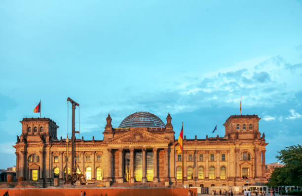 istock Reichstag building with reconstruction machines in warm sunset light! 2167815247