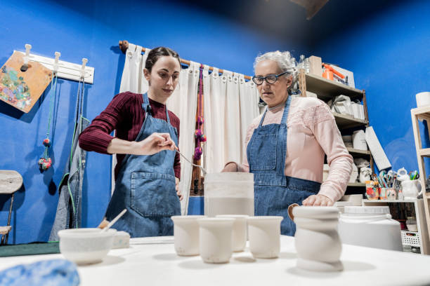 istock Coworkers working in a ceramics workshop 2167815518