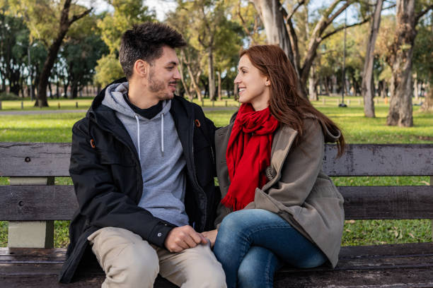 istock Couple talking in a public park 2167815945
