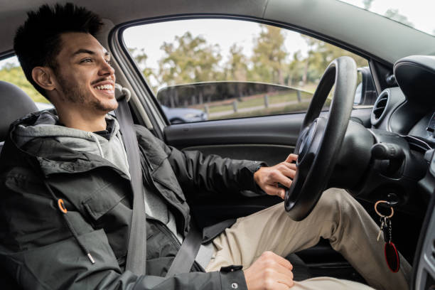 istock Mid adult man driving 2167816038