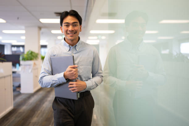 istock Smiling Young Professional in a Corporate Office 2167817727