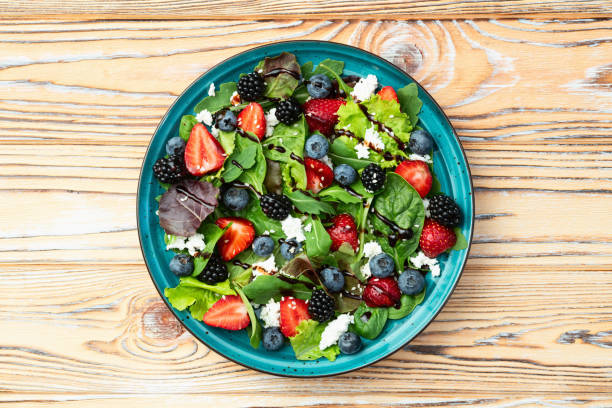istock Berries salad (blueberry strawberry blackberry ) with cheese feta and balsamic sauce 2167822699