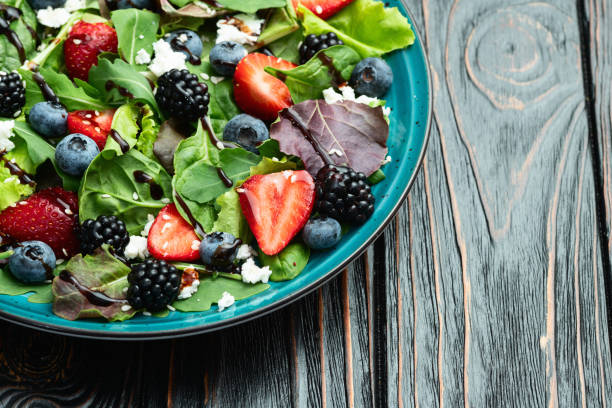 istock Berries salad (blueberry strawberry blackberry ) with cheese feta and balsamic sauce 2167822708