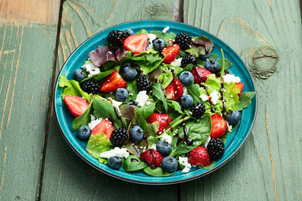 istock Berries salad (blueberry strawberry blackberry ) with cheese feta and balsamic sauce 2167822710
