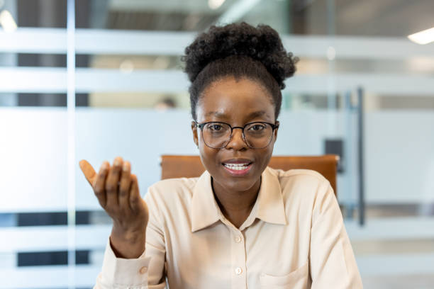 istock Focused business professional during a video call in modern office environment 2167822882